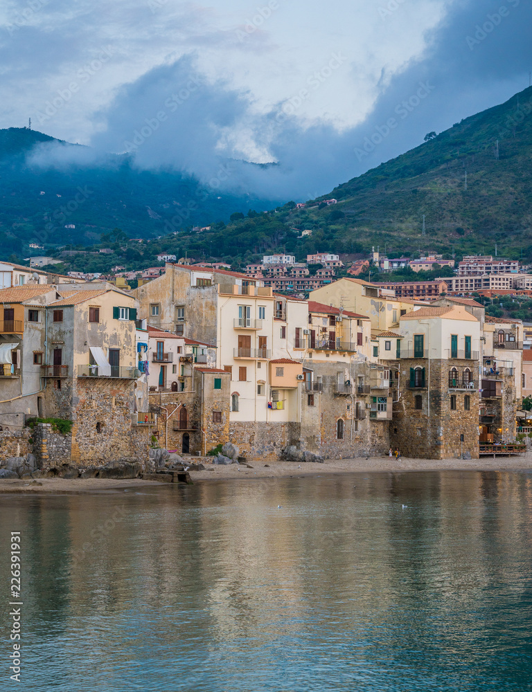Cefalù waterfront in a cloudy afternoon. Sicily, southern Italy.