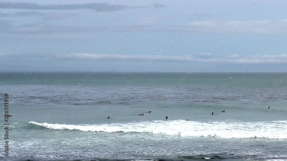Unidentified surfers at Santa Cruz, Pleasure Point, on the northern Monterey Bay in Santa Cruz County, California, USA, a world renowned surf location Unidentified surfers at Santa Cruz, Pleasure Point, on the northern Monterey Bay in Santa Cruz County, California, USA, a world renowned surf location