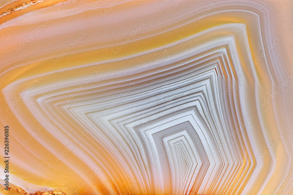 Amazing Banded Agate Crystal cross section as a background. Natural light translucent agate crystal surface, Gray abstract expressive structure slice mineral stone macro closeup - obrazy, fototapety, plakaty 