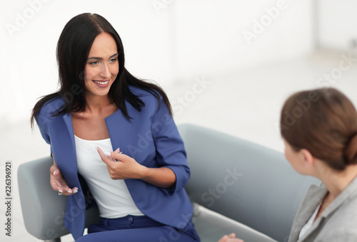 attractive business women meet in the office during a break