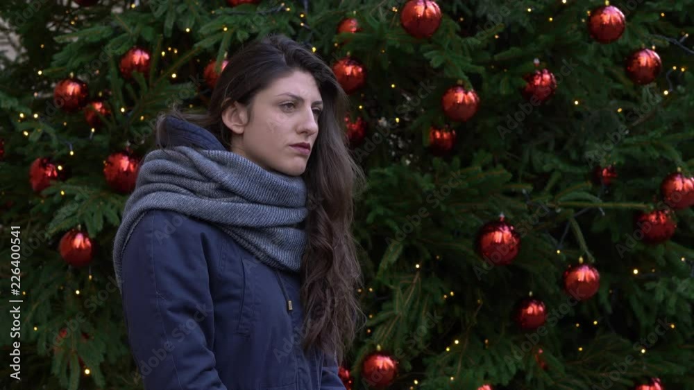 happy and romantic Christmas: young boyfriend brings the gift to his girlfriend happy and romantic Christmas: young boyfriend brings the gift to his girlfriend