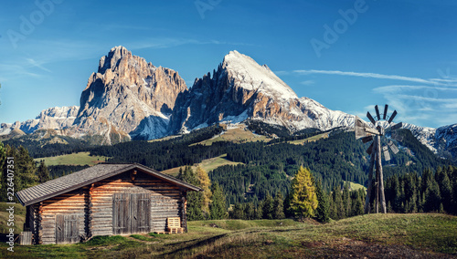 Hut with Alpe di Siusi - Seiser Alm with Sassolungo - Langkofel and Plattkofel mountains in background