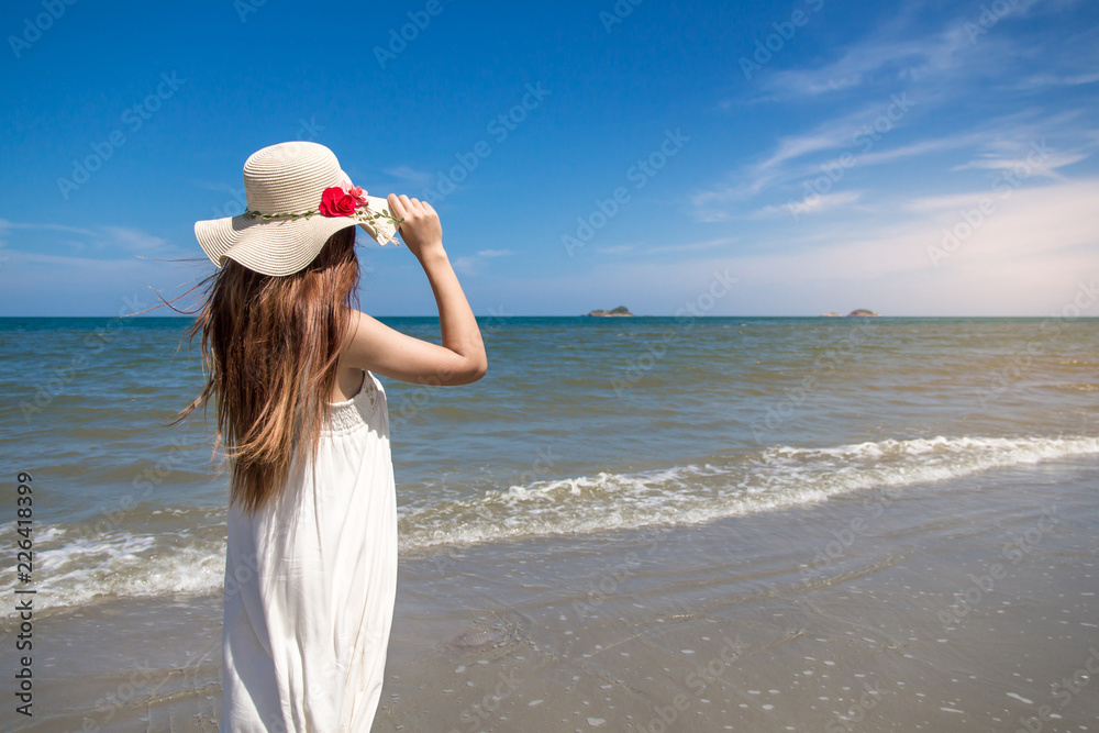 Portrait of beautiful young asian woman summer vacation on beach,Cute teenage girl at sea Portrait of beautiful young asian woman summer vacation on beach,Cute teenage girl at sea