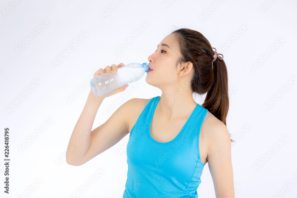 Beautiful portrait asian young woman in sport clothing drink bottle of water for healthy isolated on white background, girl with fit thirsty after exercise and fitness, health concept. Beautiful portrait asian young woman in sport clothing drink bottle of water for healthy isolated on white background, girl with fit thirsty after exercise and fitness, health concept.