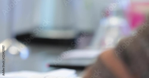 Girl Writing Notes In her Journal At An Event
