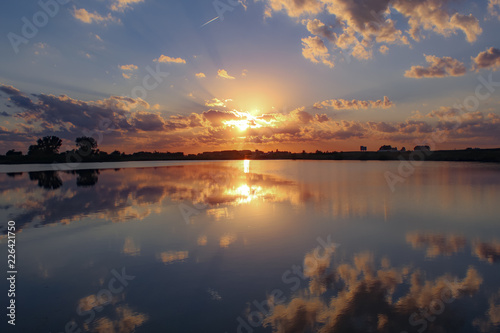 Beautiful sunset reflected in the lake.