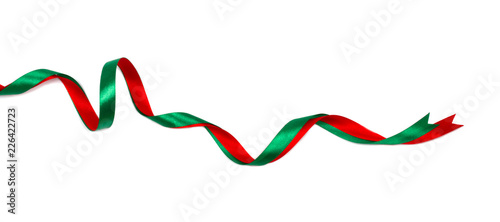 Wavy red and green ribbons isolated on white.