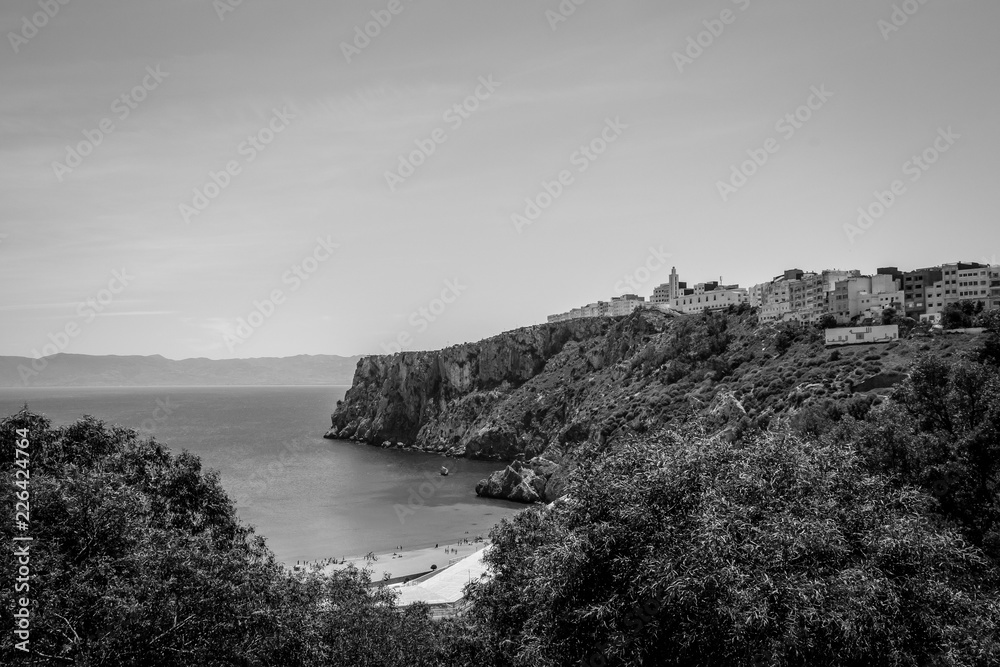 Houcima beach and waves and rocks Houcima beach and waves and rocks