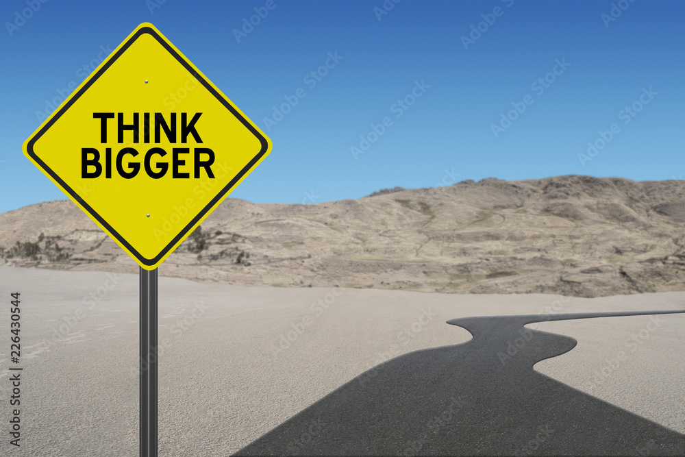 Think Bigger sign motivational concept