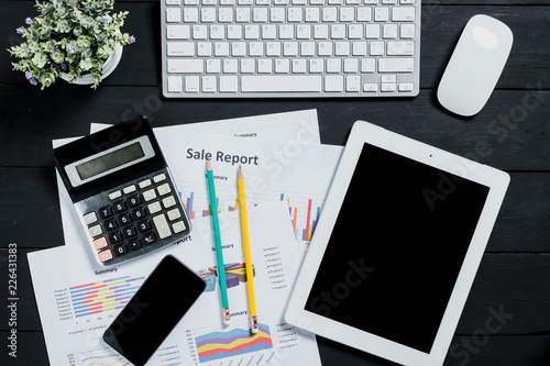 Office stuff with keyboard,mouse,smartphone,pencil,calculator,tablet and business document.Top view ,Flat lay