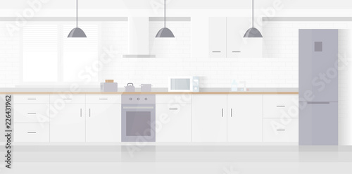 Modern new light interior of kitchen with white furniture