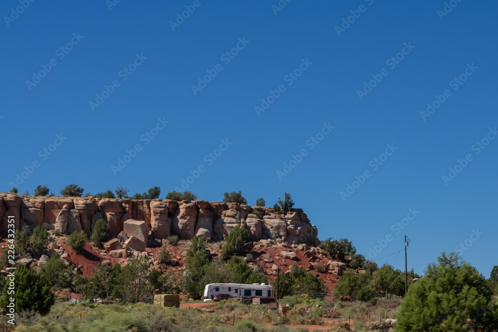 recreation vehicle in foothills of mountai