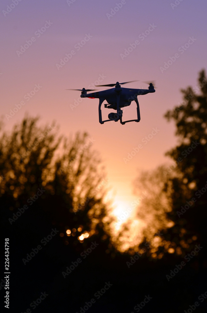 A beautiful flying drone in the evening skies. Aero photography in action.
A beautiful flying drone in the evening skies. Aero photography in action.