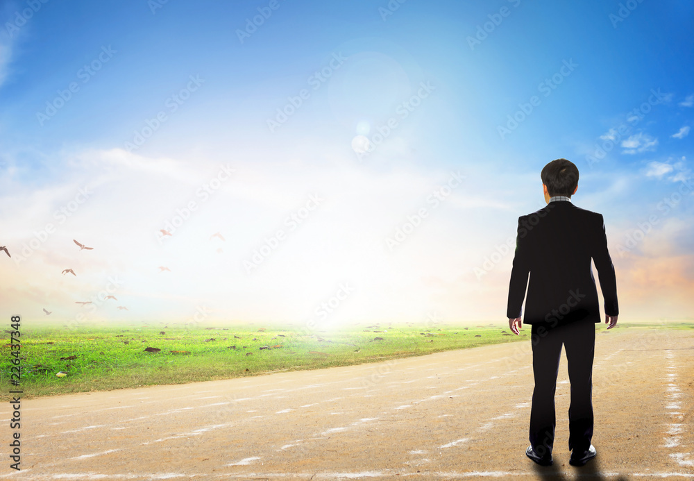 Businessman concept: businessman standing on the runway Businessman concept: businessman standing on the runway