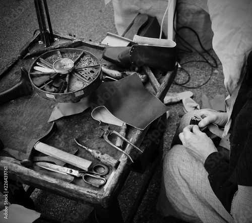 workshop with shoemaker during the processing of leather