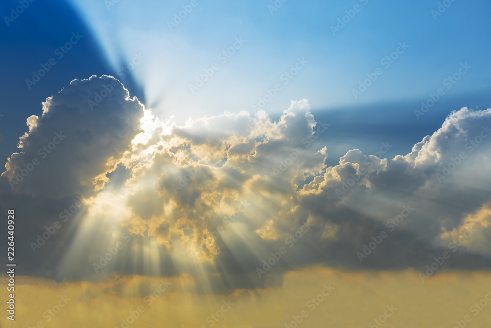 Fototapeta premium Sunset sky with cloud and sun ray. Nature background. Miracle, hope, or amazing nature concept.