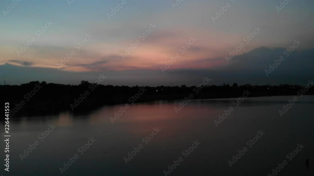 Beautiful lights from the big city and views from the lake at sunset. Beautiful lights from the big city and views from the lake at sunset.