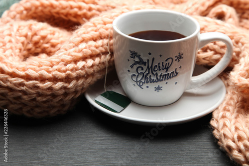 Cup of tea and winter scarf