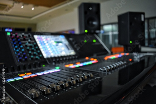 Audio controls in media control room.