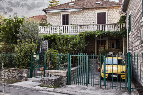 House with yellow car. The Town Of Kotor. Montenegro