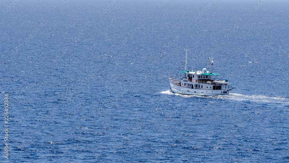 fishing boat alone in the sea