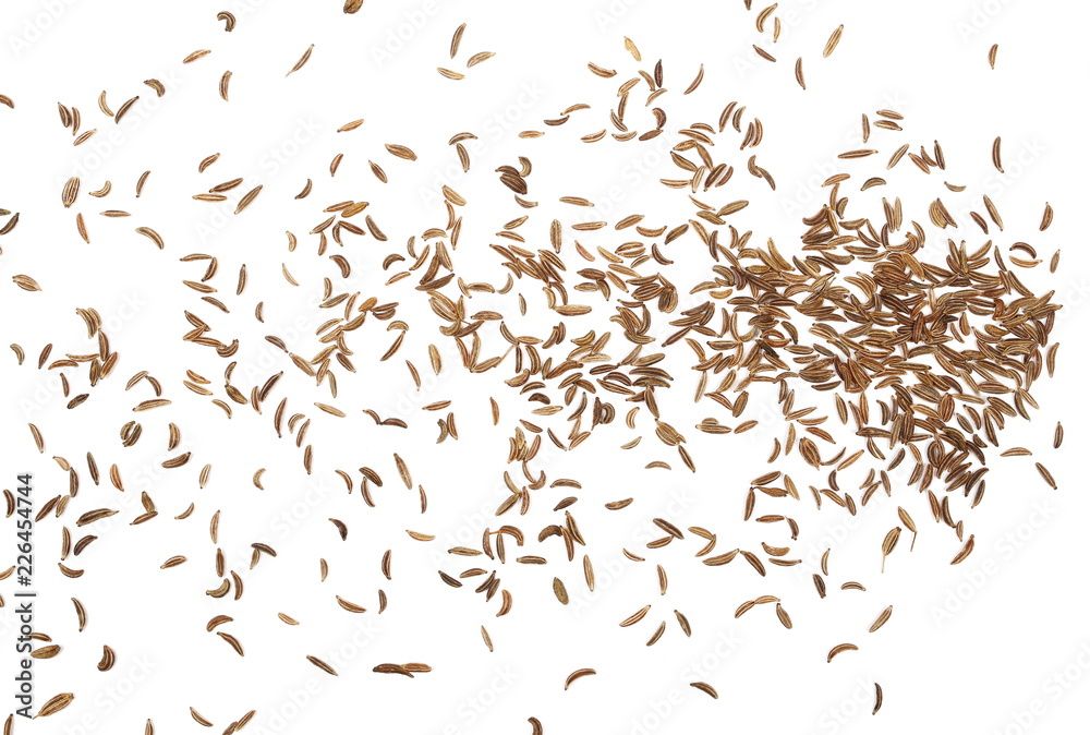 Pile of cumin, caraway seeds isolated on white background, top view Pile of cumin, caraway seeds isolated on white background, top view
