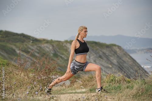 Woman doing outdoor fitness exercises