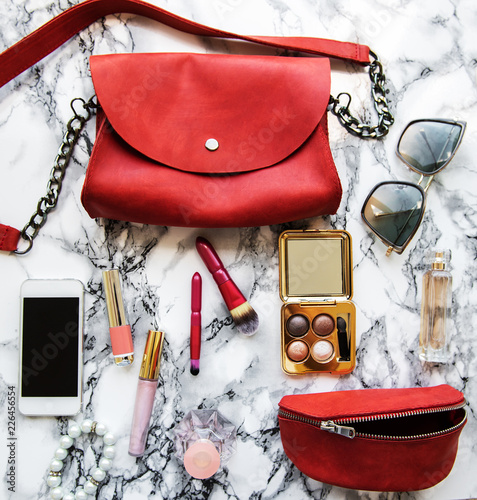 Red leather bag with accessories