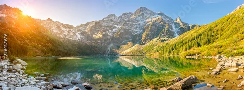 Panel kuchenny z motywem Tatra National Park, a lake in the mountains at the dawn of the sun. Poland