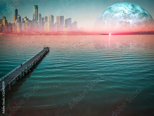 Long wooden pier stretching into the ocean at beautiful sunset.