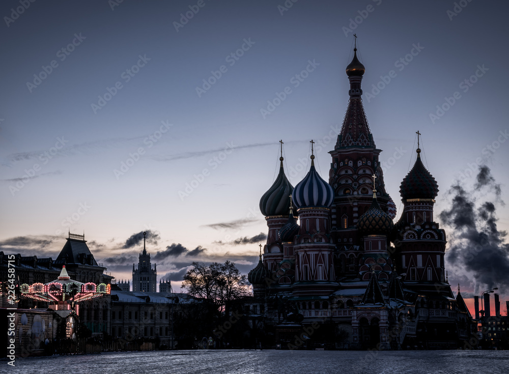 Fototapeta premium Cathedral of Vasily the Blessed and Spasskaya Tower. Winter Moscow before Christmas and New Year. Kremlin, Moscow, Russia. January 9, 2018