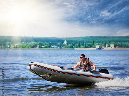 Foto Inflatable white motor boat
