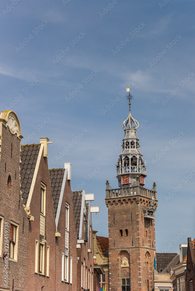 Row of houses and hisotric tower in the center of Monnickendam, Netherlands