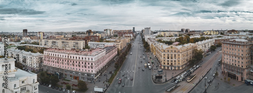 Aerial; drone view of Chelyabinsk city center in autumn cloudy day; the mixture of styles in architecture; problems of healthy lifestyle of single-industry city; Russia