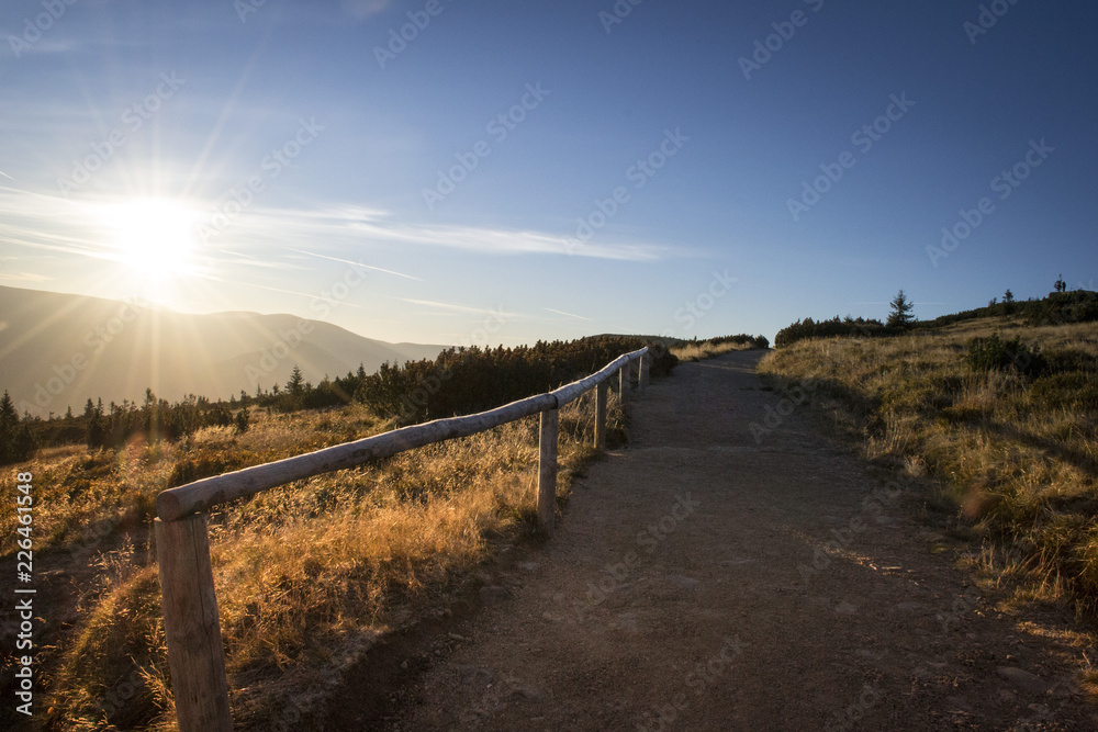 Beautiful colorful hiking road path at Krkonoše mountain national park at sunrise at sunset