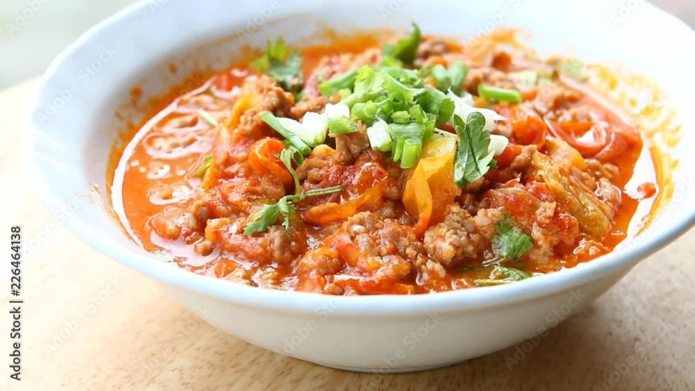 Thai northern style pork and tomato relish or Nam-Prik-Ong Thai northern style pork and tomato relish or Nam-Prik-Ong