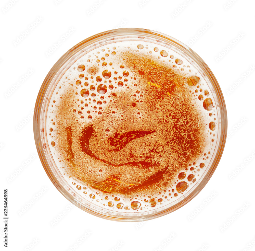 top view of glass of lager beer with froth isolated on white background top view of glass of lager beer with froth isolated on white background