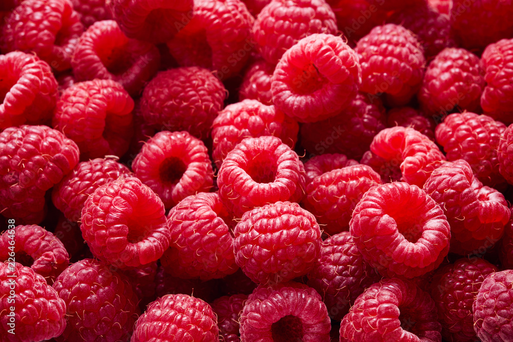 top view of raspberry fruits as textured background