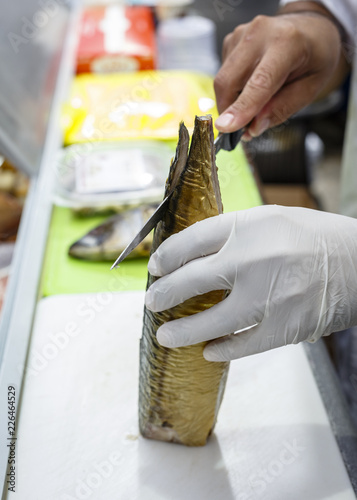 Chef slicing fish, Jerusalem, Israel. photo