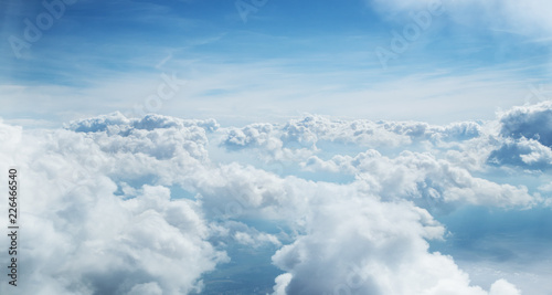Blue sky and clouds background with lots of copy space. © Lukas Gojda