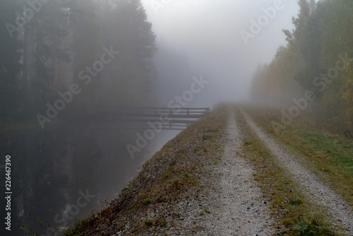 calm and foggy morning near a channel in Sweden