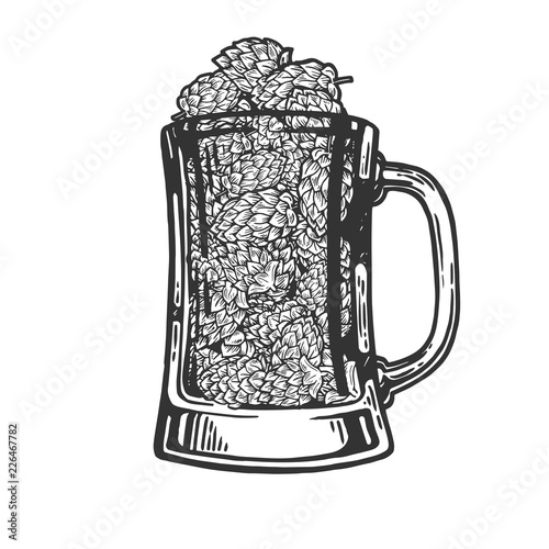 Hops plant in beer cup engraving vector illustration. Scratch board style imitation. Black and white hand drawn image.