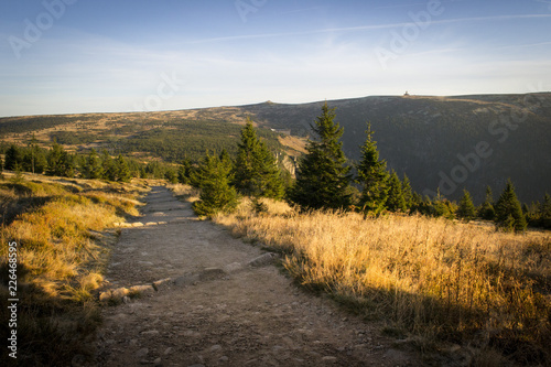 Krkonoše Giant mountains beautiful morning outdoor hike on the top of the hill at sunrise at sunset