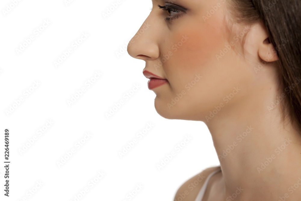 Close up of young beautiful woman with makeup on white backgeound Close up of young beautiful woman with makeup on white backgeound