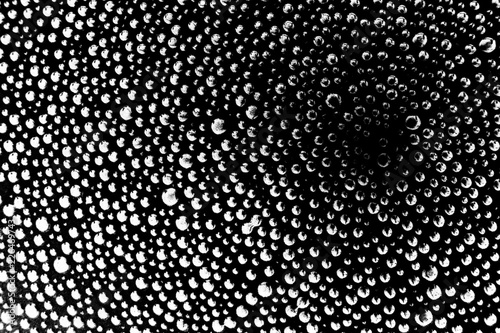 Black and white grunge creative trendy bubbled background or texture, desaturated high contrast image