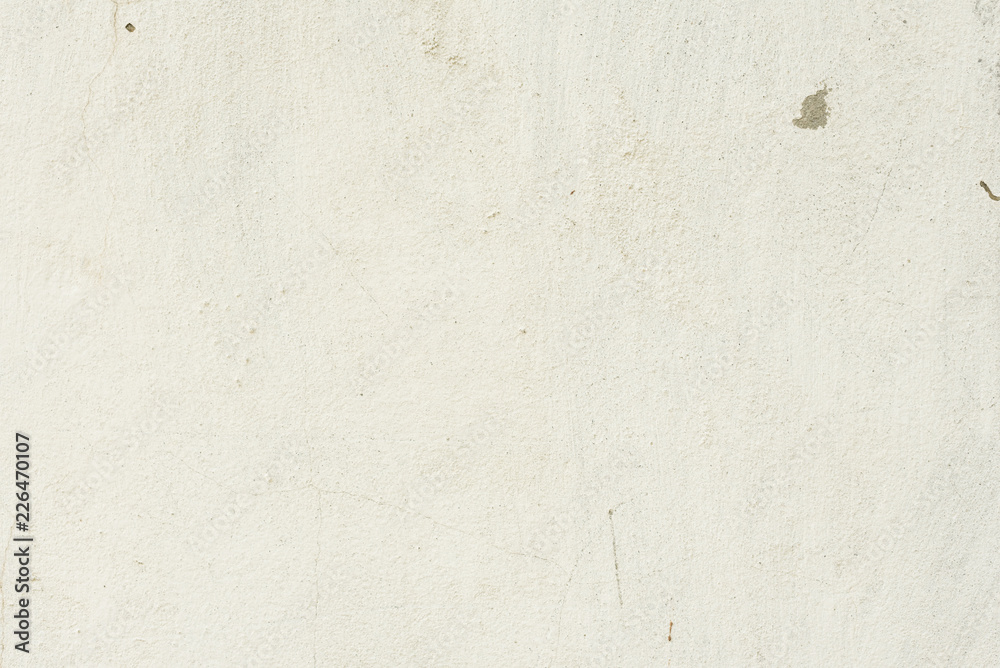 Fototapeta premium Wall fragment with scratches and cracks. It can be used as a background