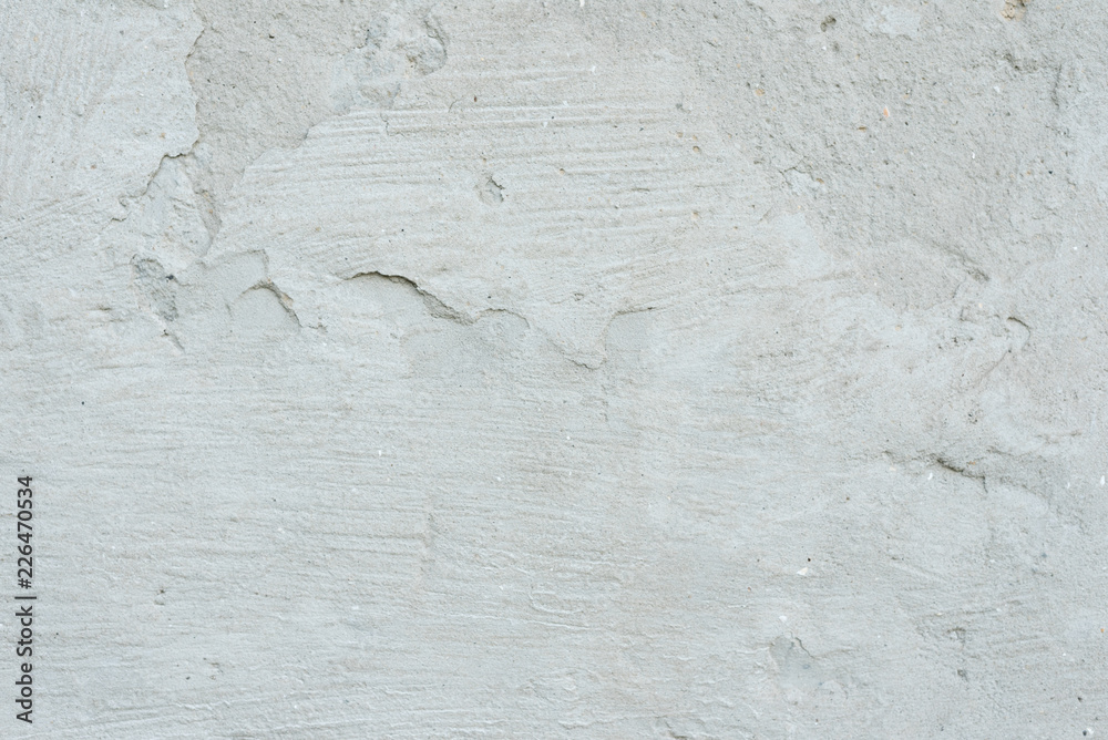 Wall fragment with scratches and cracks. It can be used as a background Wall fragment with scratches and cracks. It can be used as a background