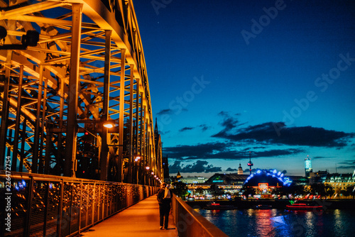 Hohenzollernbrücke in Köln bei Nacht photo