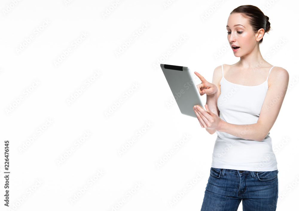 Beautiful woman browsing internet on tablet Beautiful woman browsing internet on tablet