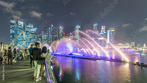 Photography Light and Water Show along promenade in front of Marina Bay Sands